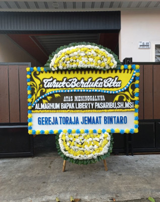 Papan Bunga Duka di Dasan Agung Baru